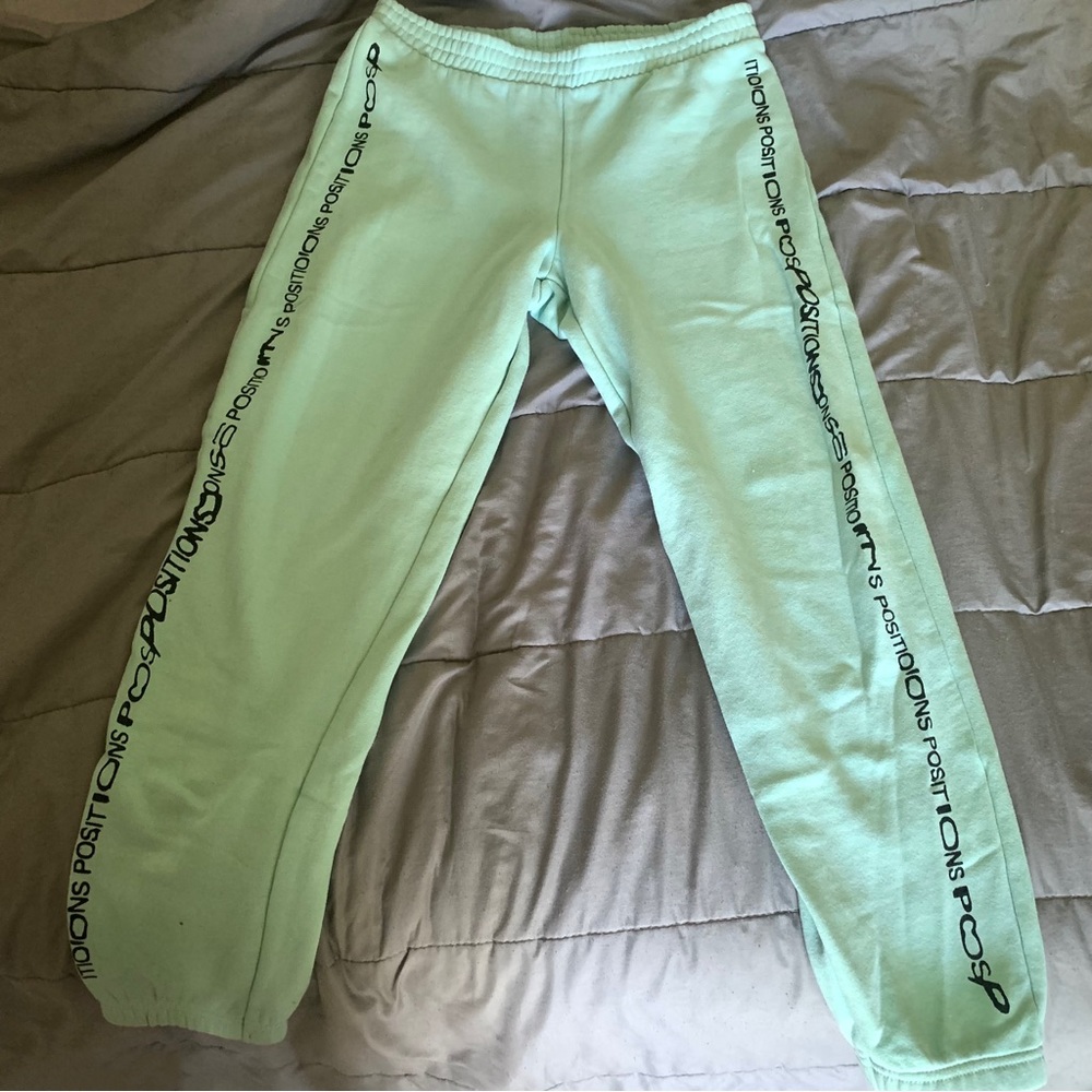 ariana grande positions sweatpants